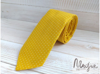 Жовта краватка в горошок